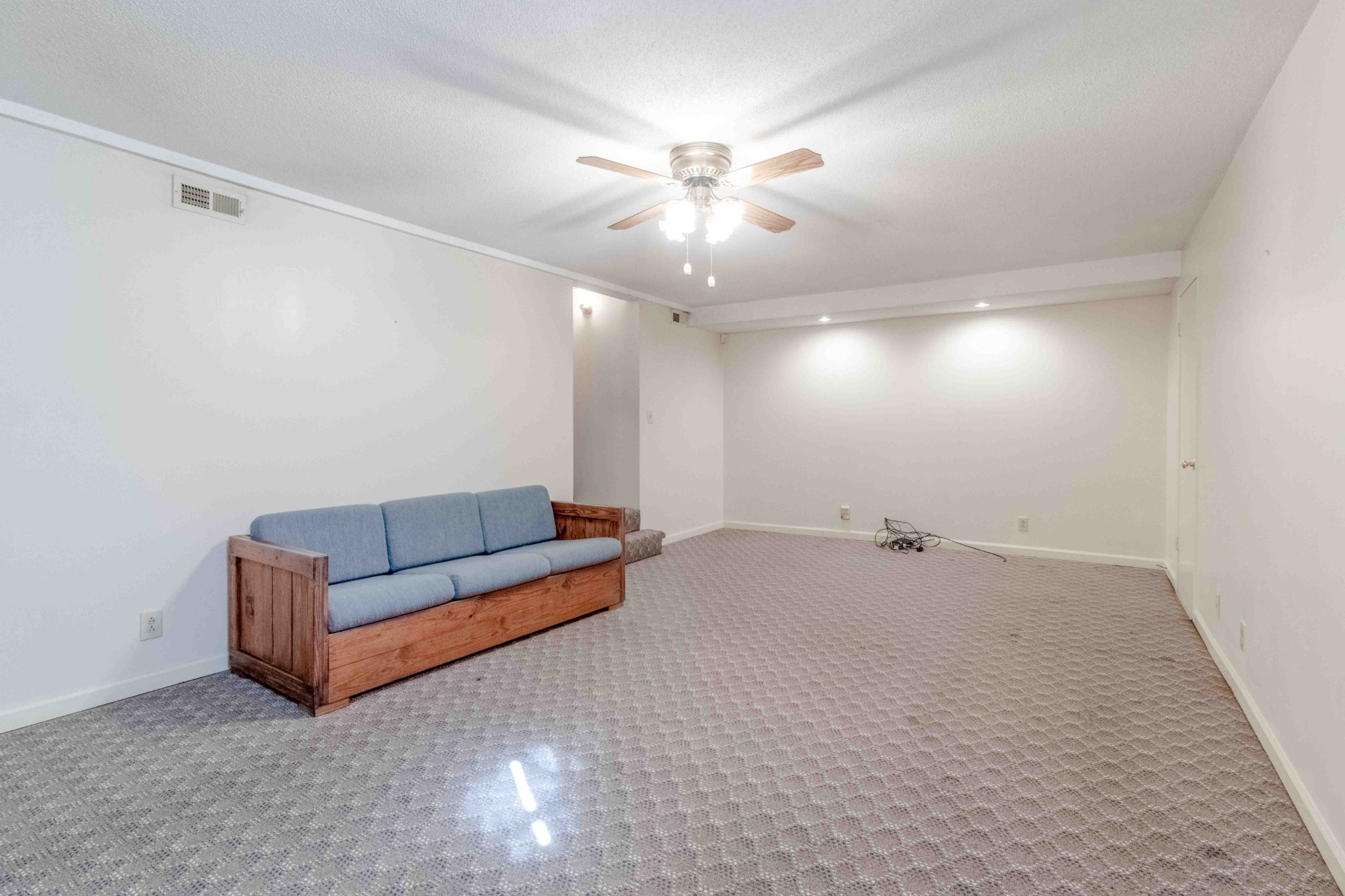 4316 Memory Lane Adams, TN 37010 - Photo 33 of 45 a living room with furniture and a ceiling fan