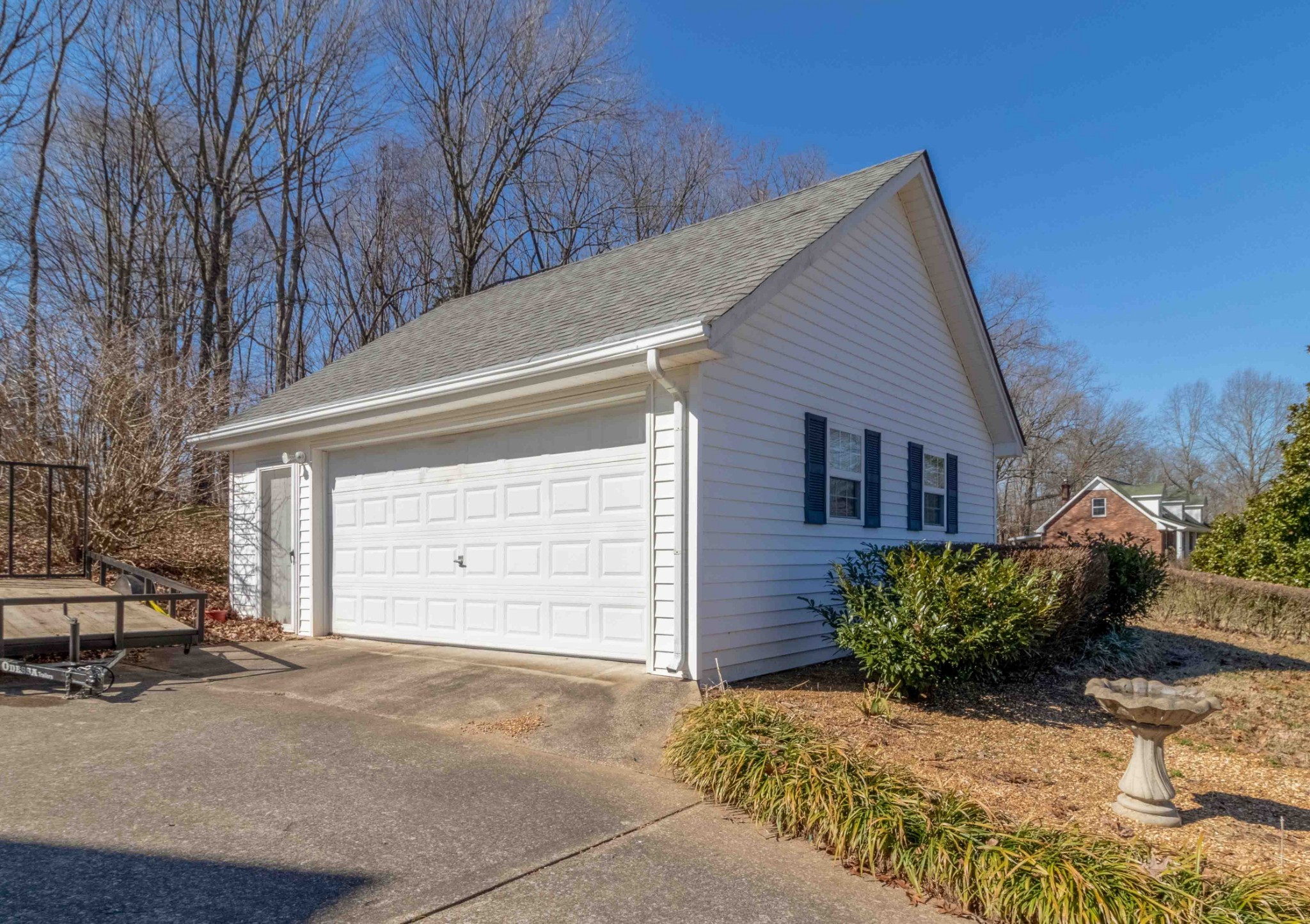 4316 Memory Lane Adams, TN 37010 - Photo 35 of 45 a view of a house with a yard and garage