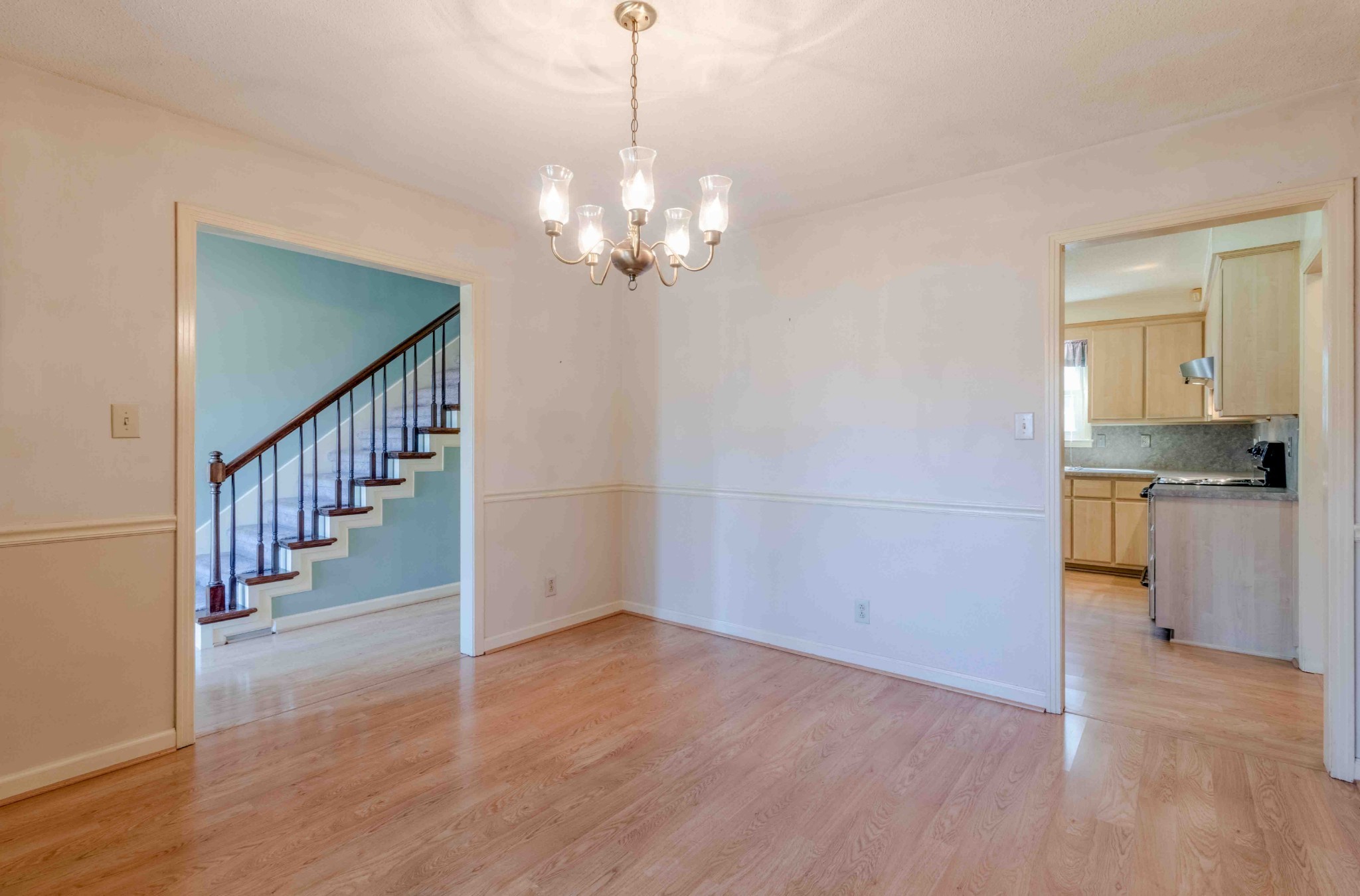 4316 Memory Lane Adams, TN 37010 - Photo 10 of 45 a view of an empty room with a window and wooden floor
