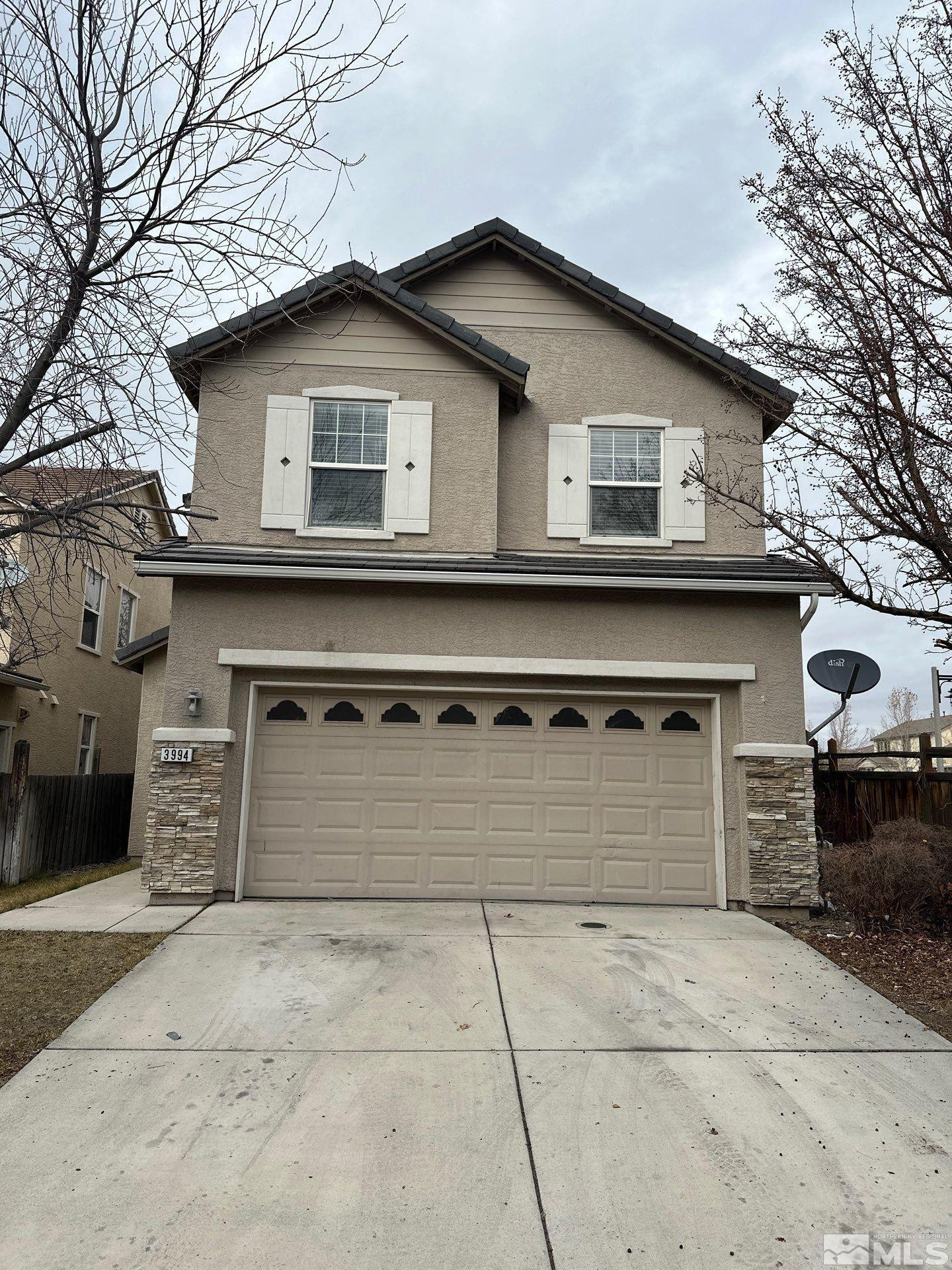3994 Dominus Drive Sparks, NV 89436 - Photo 1 of 18 a house view with a outdoor space