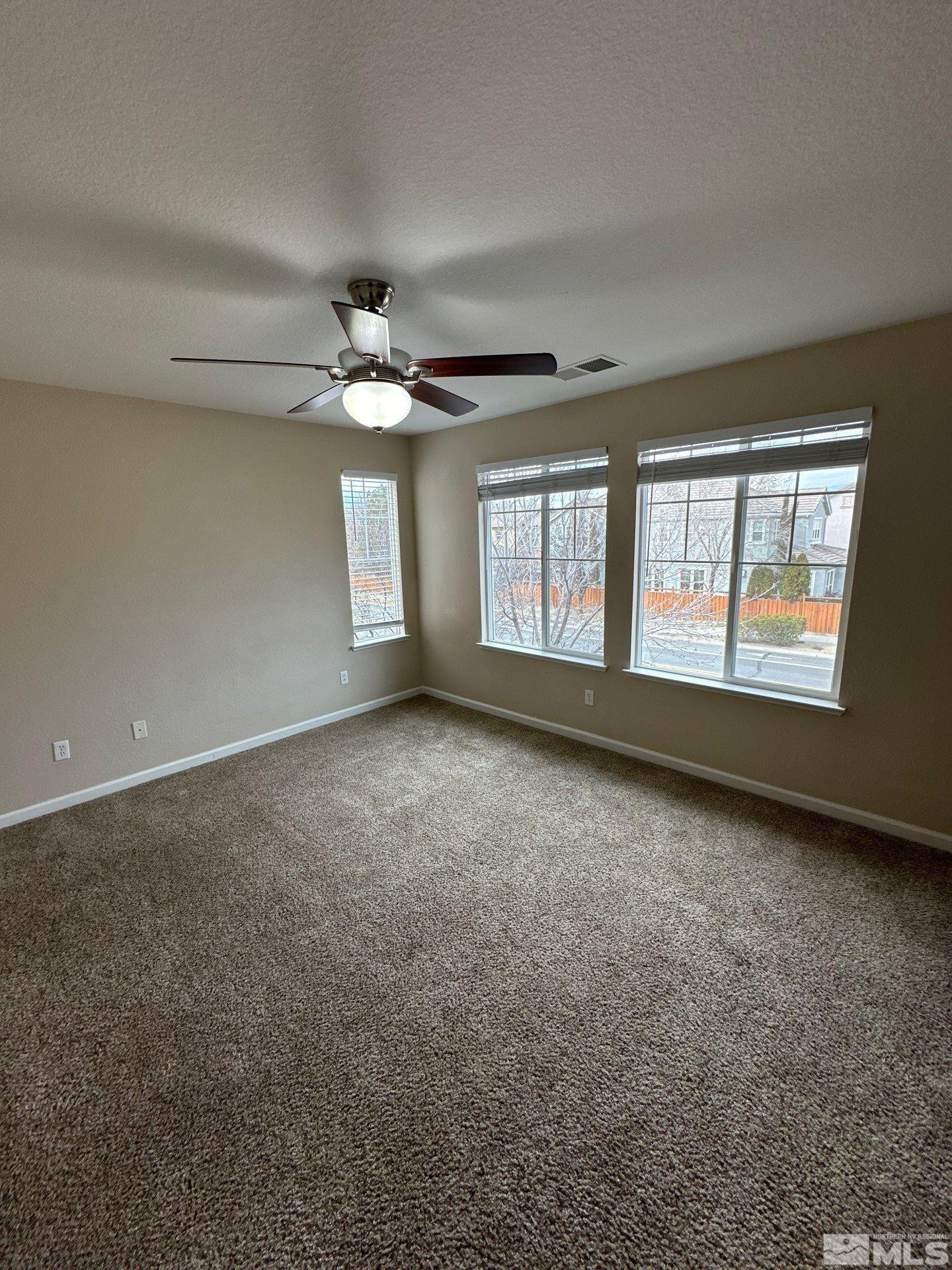 3994 Dominus Drive Sparks, NV 89436 - Photo 15 of 18 a view of an empty room with a window