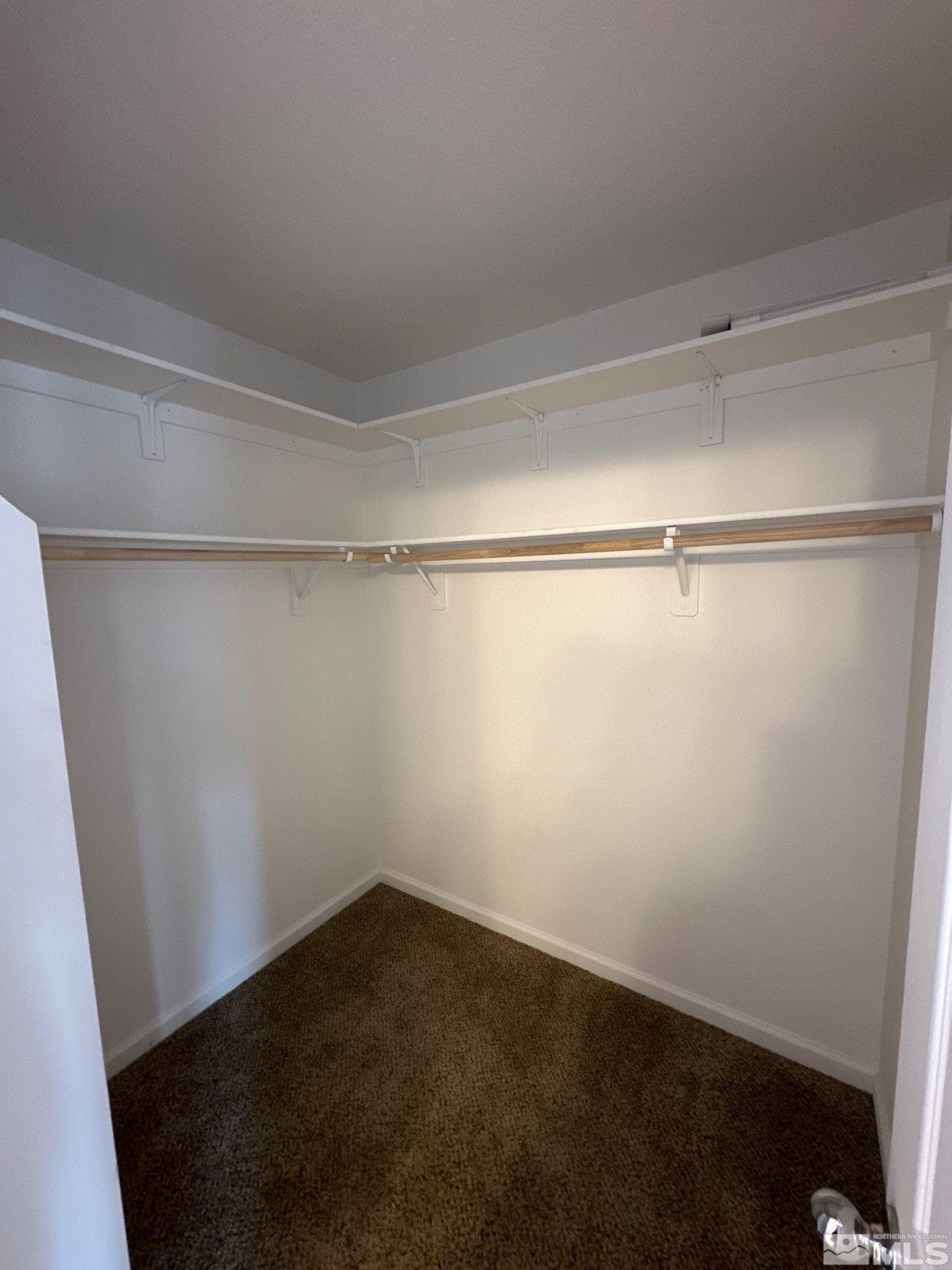 3994 Dominus Drive Sparks, NV 89436 - Photo 17 of 18 a view of a room with shelf on the wall