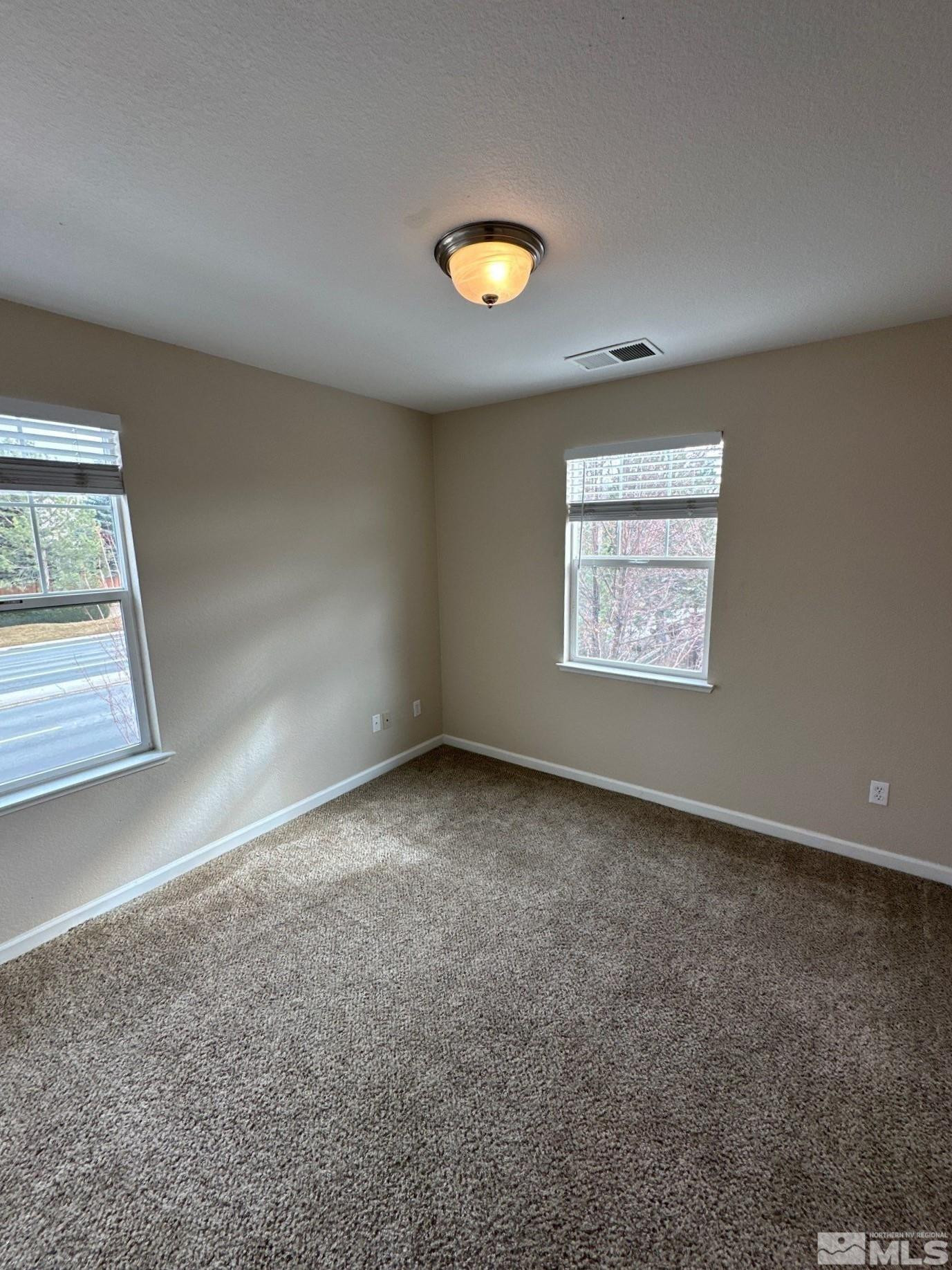 3994 Dominus Drive Sparks, NV 89436 - Photo 10 of 18 an empty room with a window