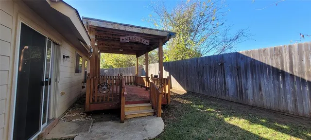 a bathroom with a sink a mirror and a shower