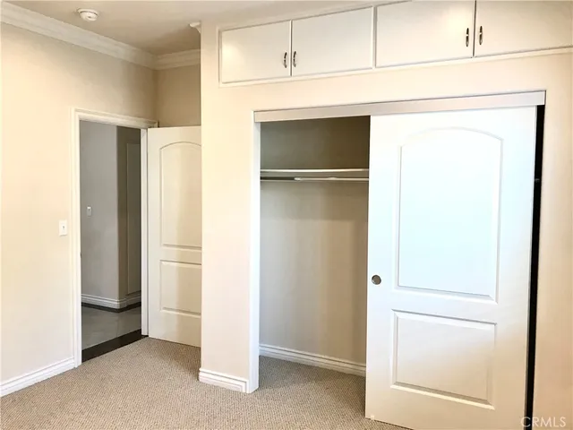 a view of a closet in the kitchen