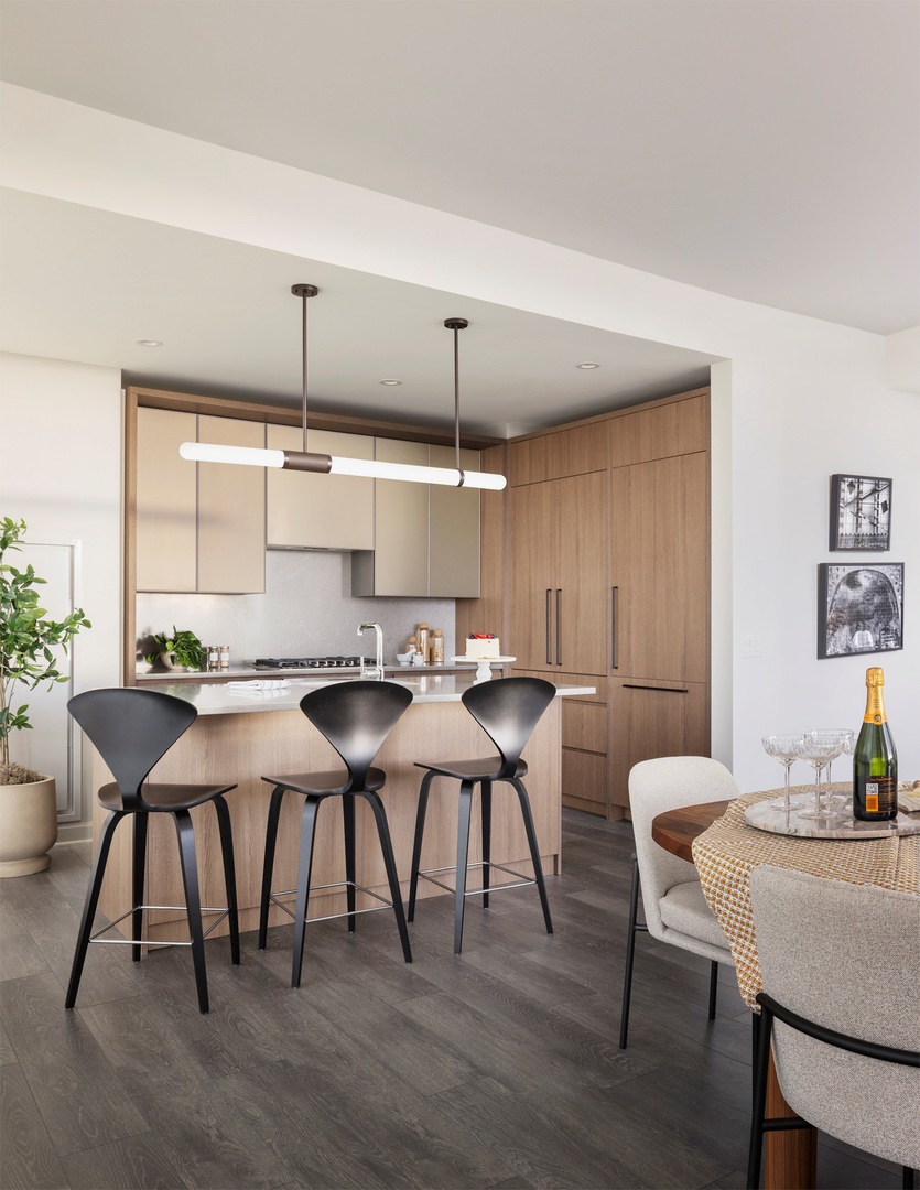 164 North Peoria Street, Unit 3002 Chicago, IL 60607 - Photo 2 of 20 a view of a dining room with furniture and wooden floor