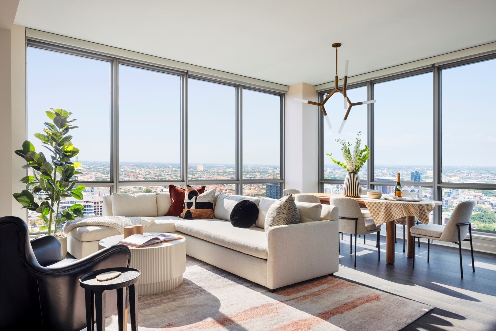 164 North Peoria Street, Unit 3002 Chicago, IL 60607 - Photo 3 of 20 a living room with furniture and a large window