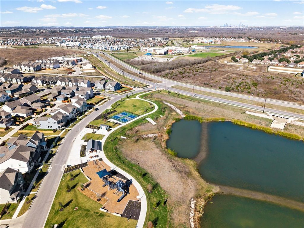 6416 Cowman Way Austin, TX 78747 - Photo 29 of 30 an aerial view of a house with a lake