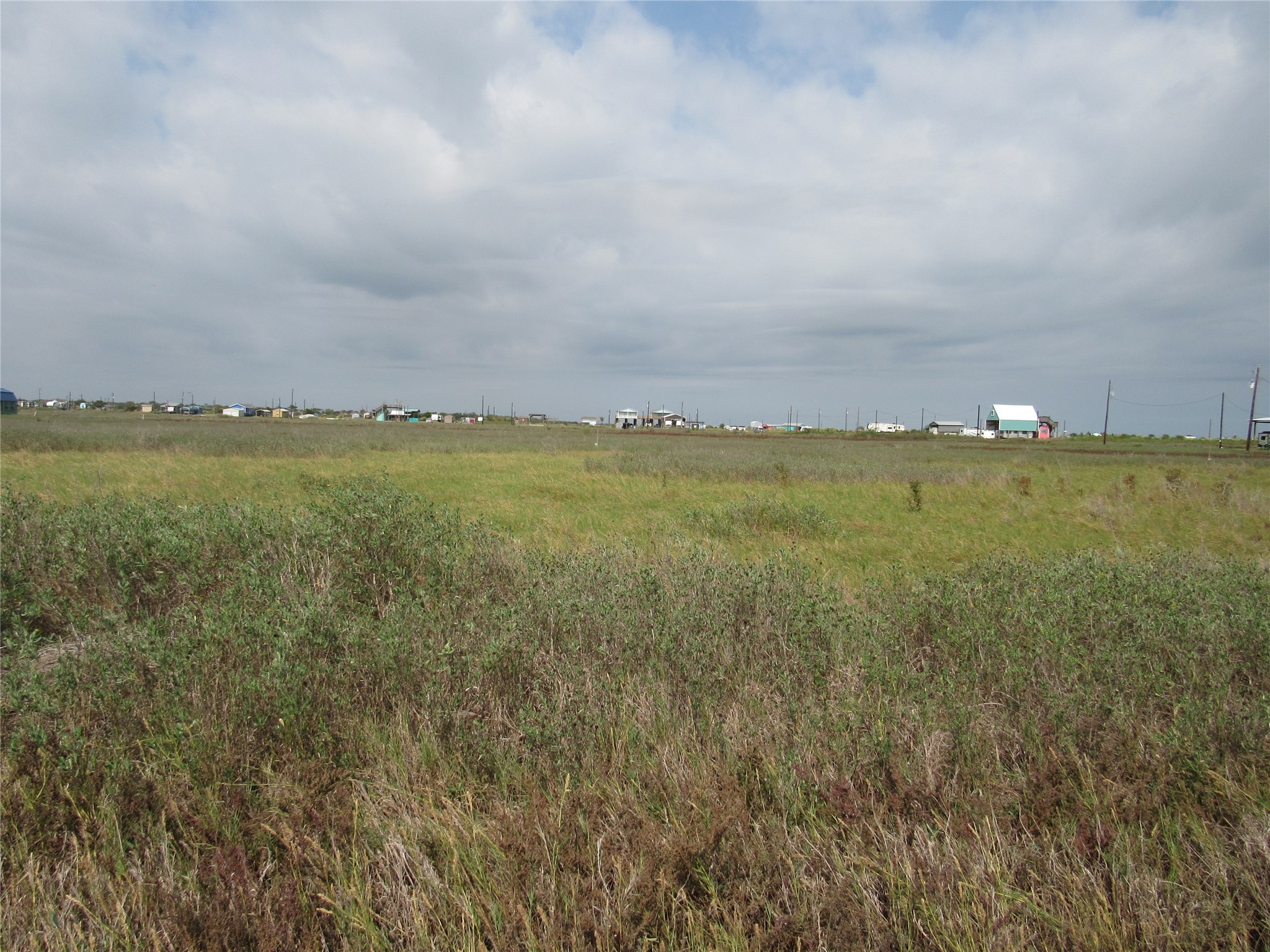294 Nautilus Street Sargent, TX 77414 - Photo 3 of 4 a view of an ocean and beach