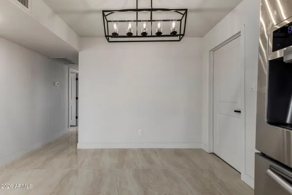 a view of a livingroom with a flat screen tv