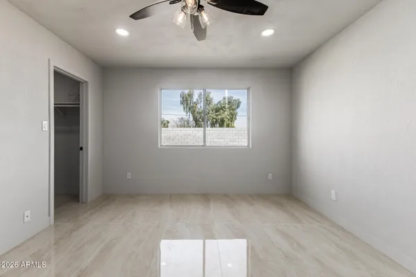 an empty room with windows