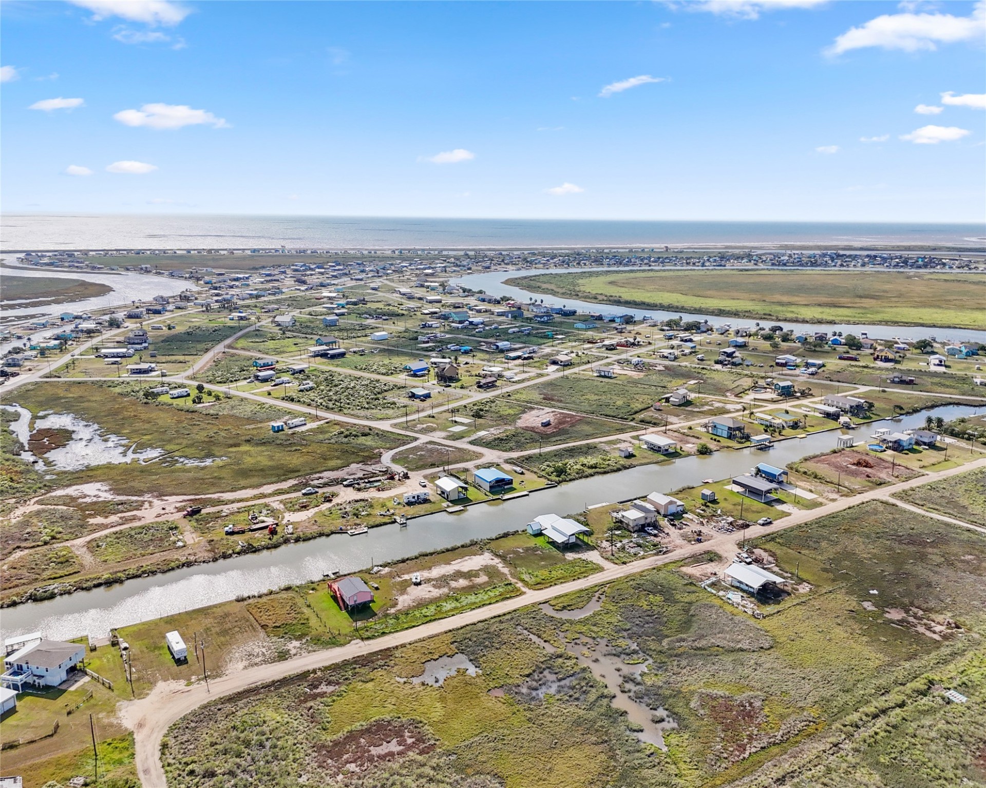 14507 Chimaera Road Sargent, TX 77414 - Photo 12 of 27 an aerial view of residential building and ocean view