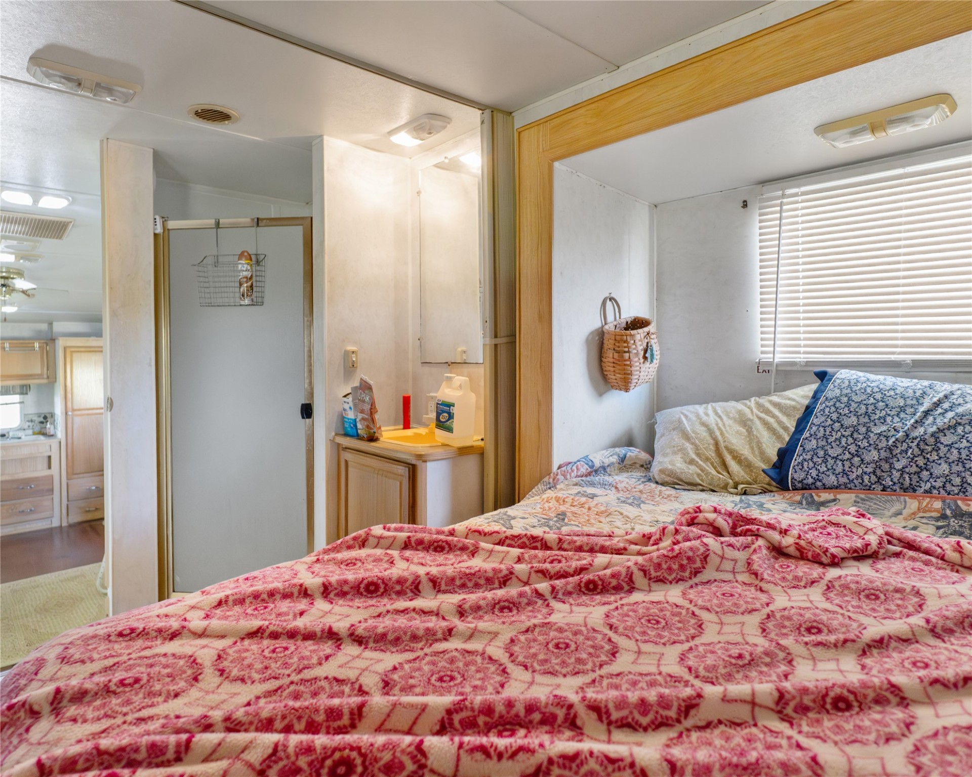 14507 Chimaera Road Sargent, TX 77414 - Photo 18 of 27 a bedroom with a bed and a dresser