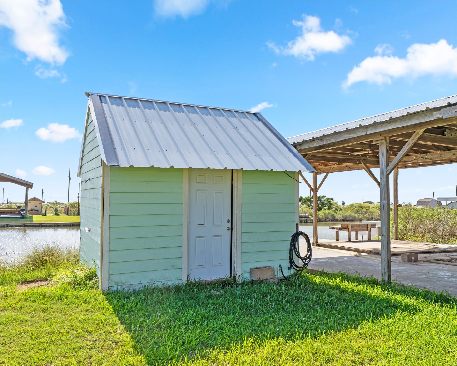 14507 Chimaera Road Sargent, TX 77414 - Photo 21 of 27 a view of a backyard with a garden