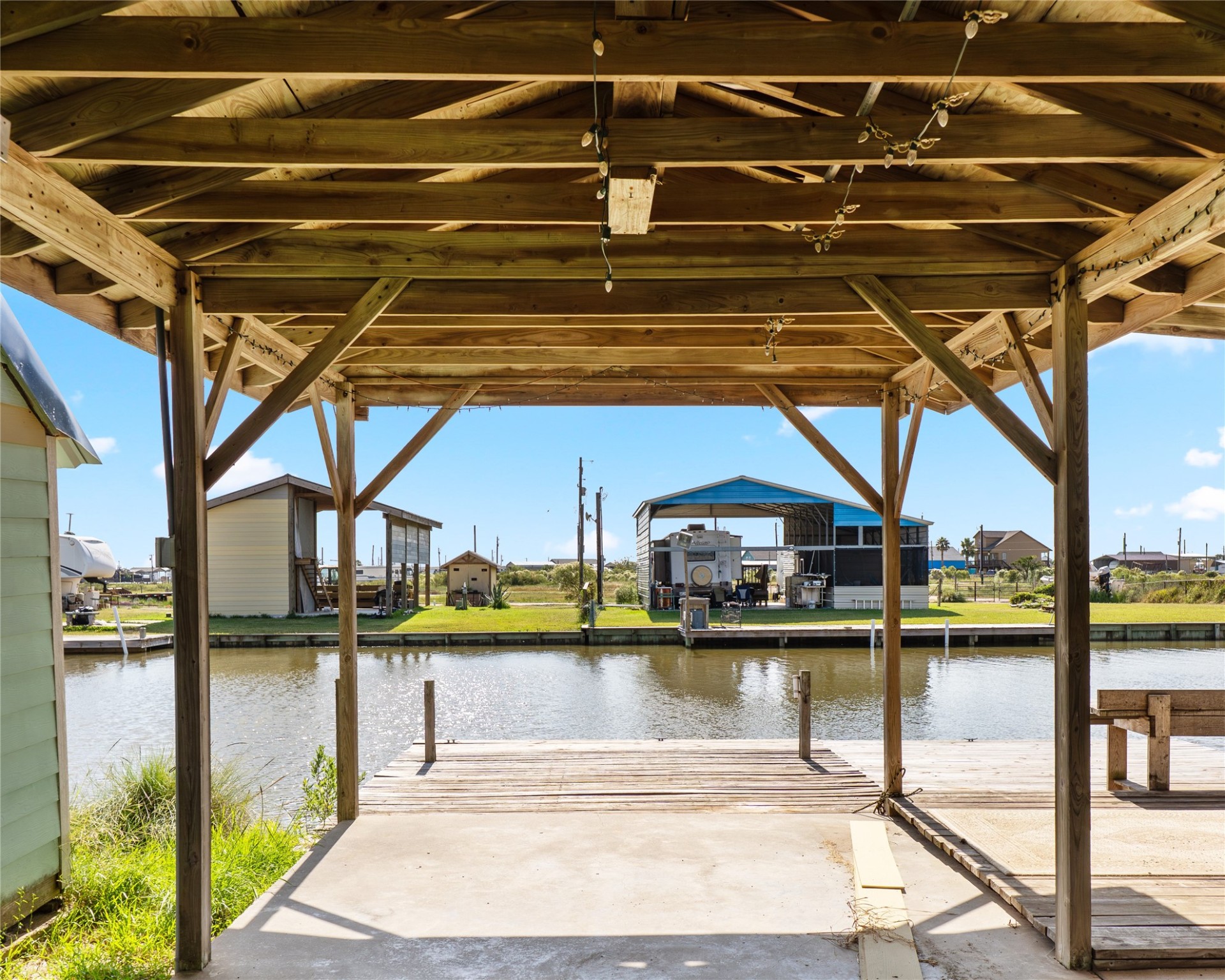 14507 Chimaera Road Sargent, TX 77414 - Photo 22 of 27 a view of a swimming pool with outdoor seating
