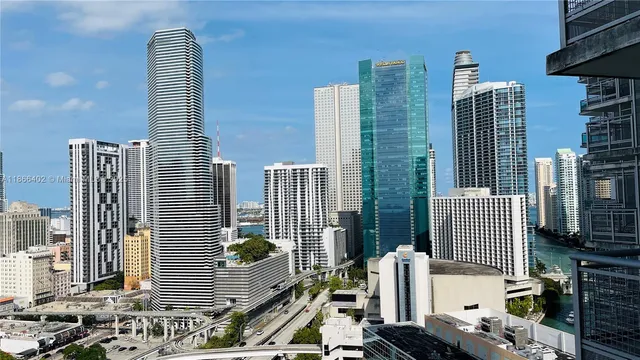 a view of a city with tall buildings