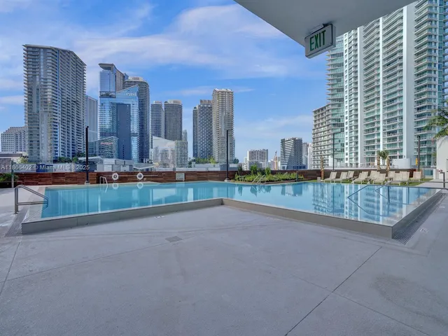 a view of a city with tall buildings