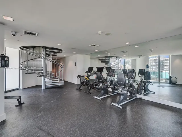 a view of a room with gym equipment