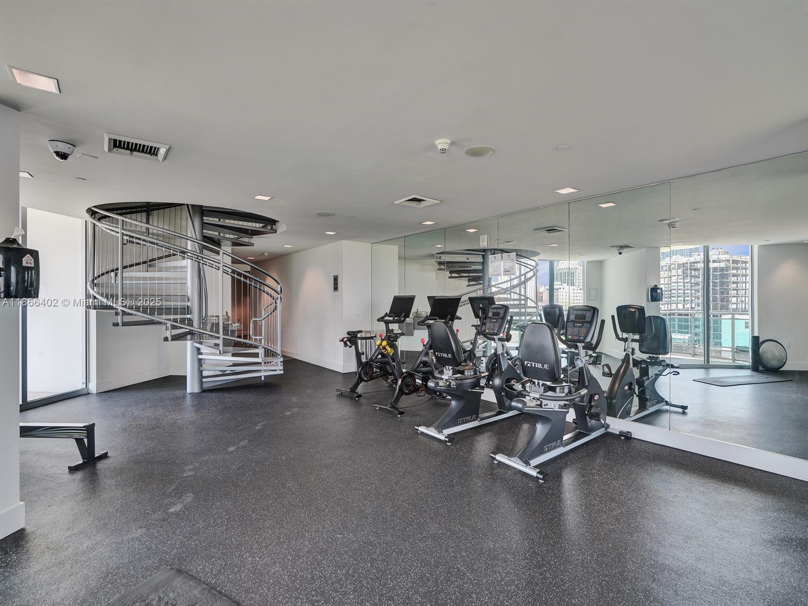 350 South Miami Avenue, Unit 2611 Miami, FL 33130 - Photo 19 of 34 a view of a room with gym equipment