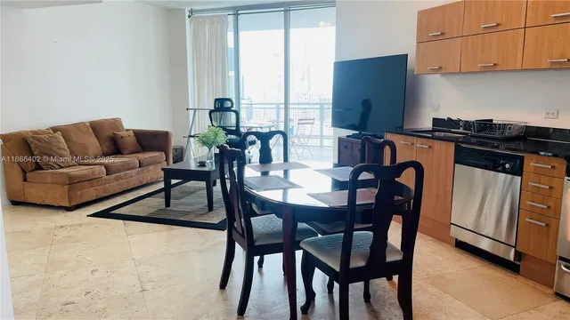 a bedroom with a bed and a mirror