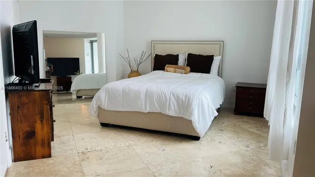 a bathroom with a toilet a sink and a bathtub