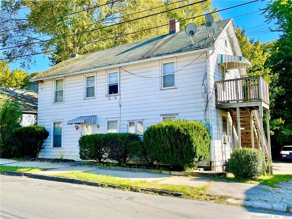 20 8th Street Derby, CT 06418 - Photo 1 of 1 a front view of a house with a yard and potted plants