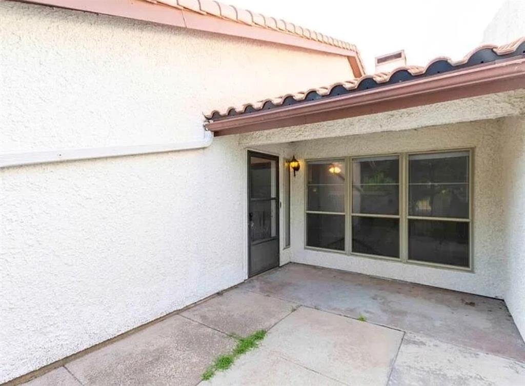 817 West Rochelle Road Irving, TX 75062 - Photo 20 of 21 a view of a house with a large window