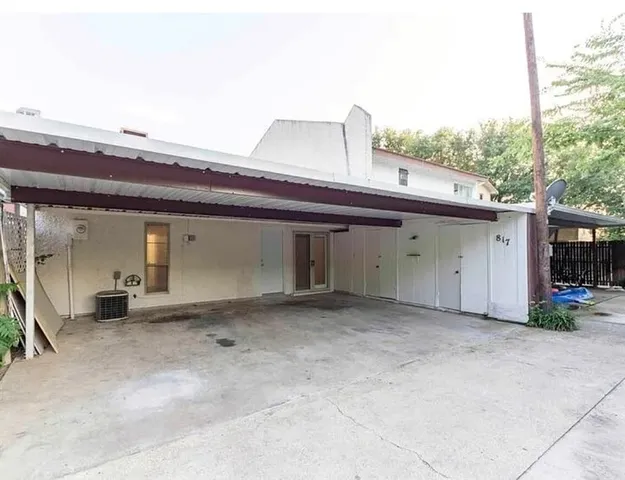 a view of a house with a garage