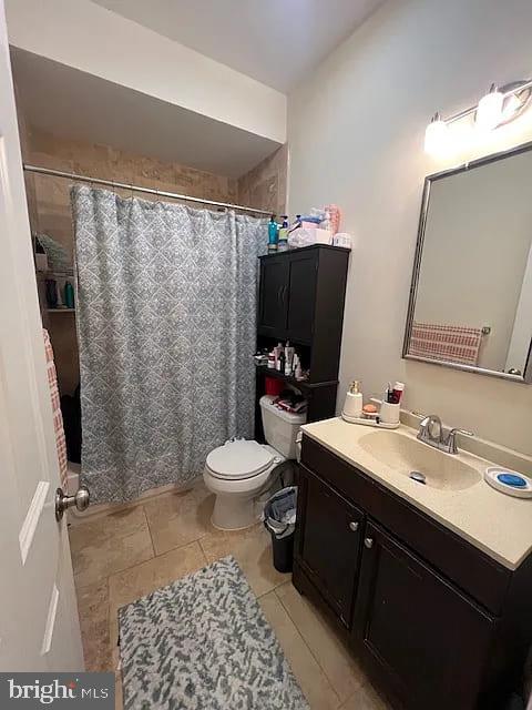 923 North 19th Street, Unit 2R Philadelphia, PA 19130 - Photo 4 of 8 a bathroom with a toilet sink and mirror