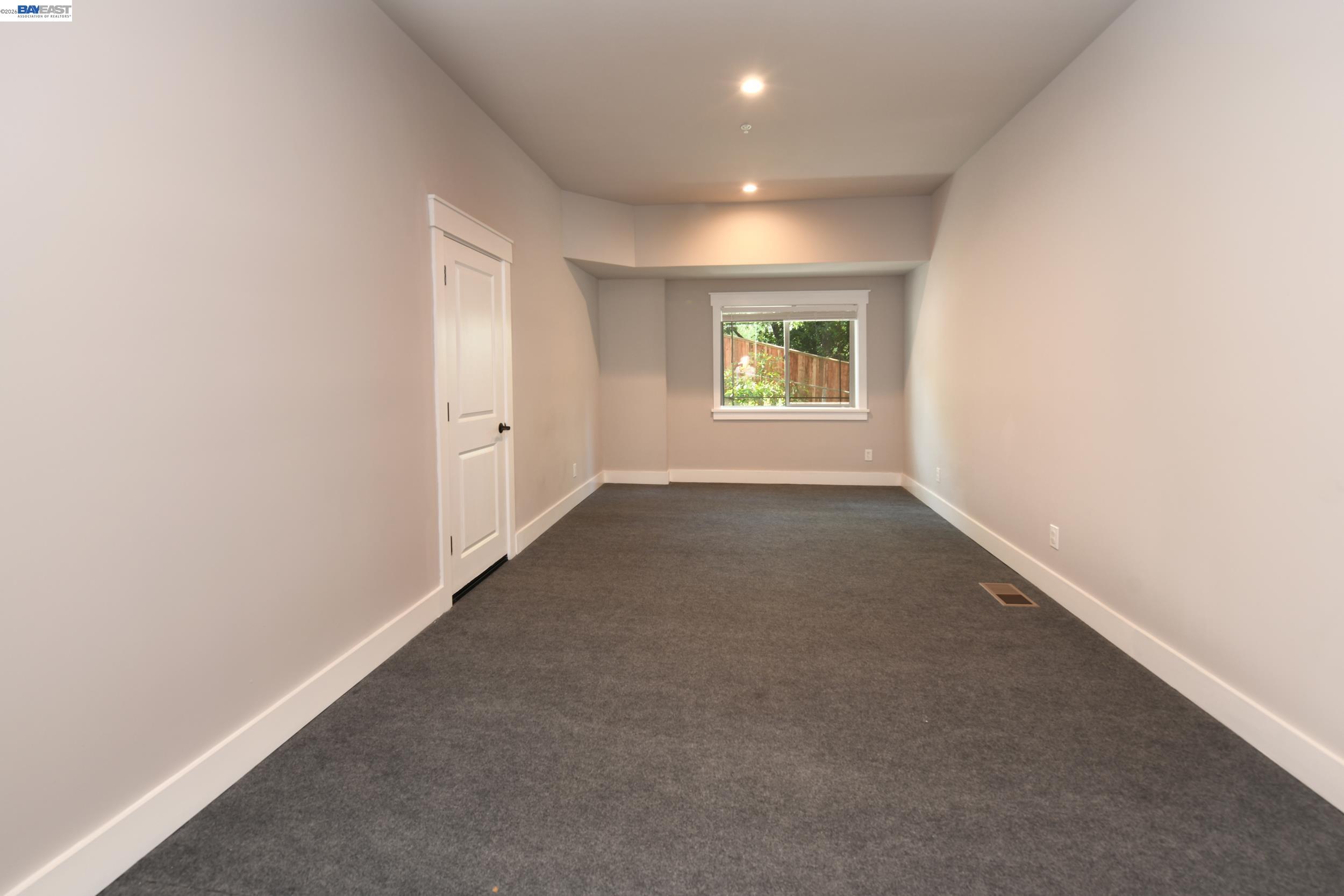 1516 Pleasant Hill Road Lafayette, CA 94549 - Photo 18 of 38 an empty room with windows