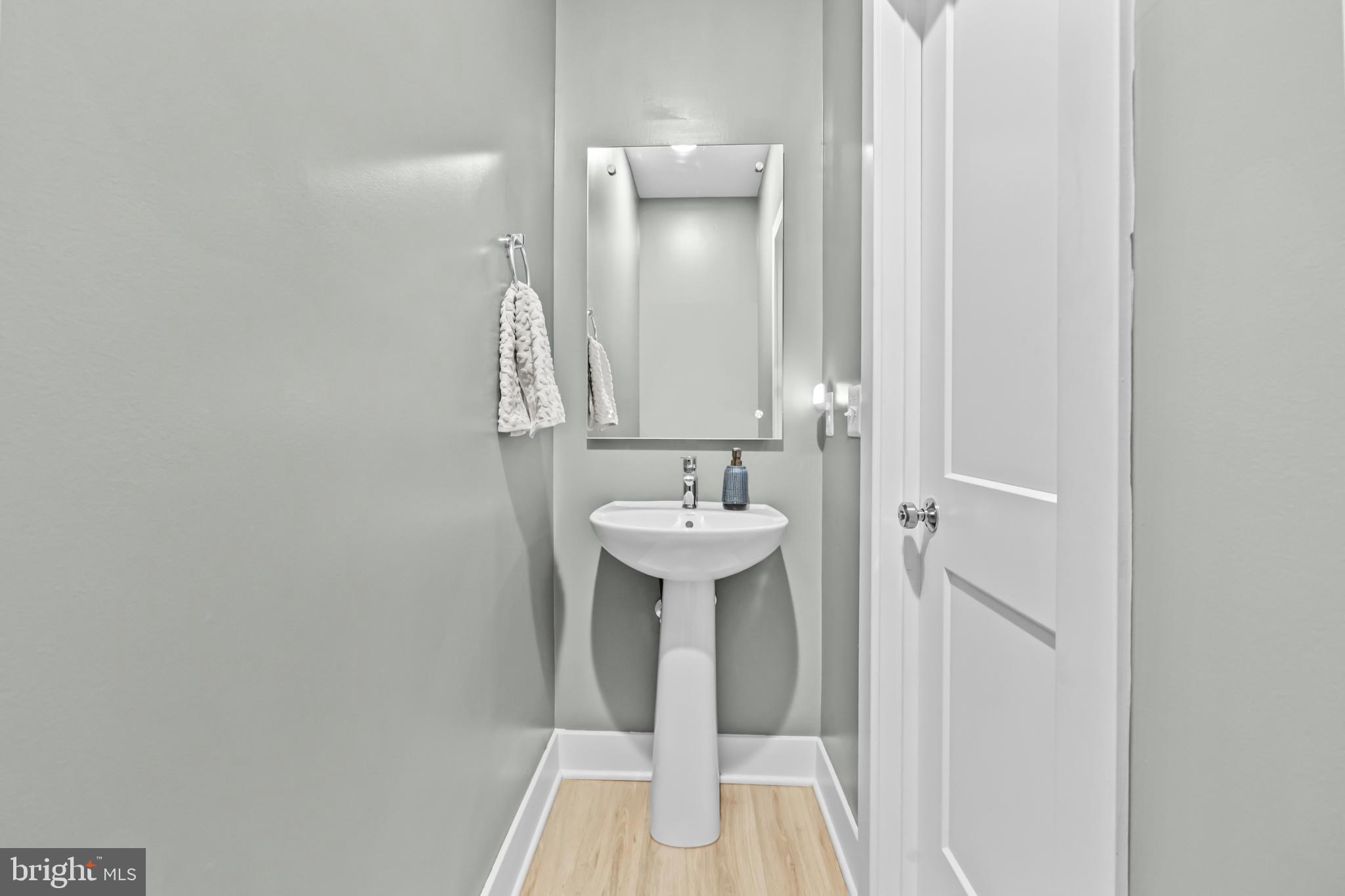 4509 12th Street Northeast Washington, DC 20017 - Photo 16 of 45 a bathroom with a sink and a mirror