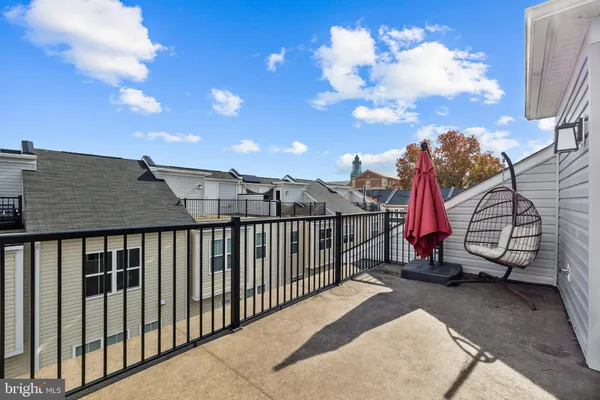 a view of a wrought iron fences in front of house