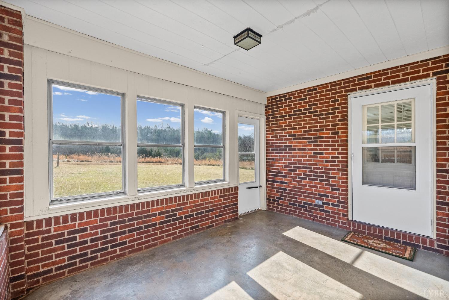 794 Little Dogwood Road Spout Spring, VA 24593 - Photo 14 of 54 a view of a door and a window