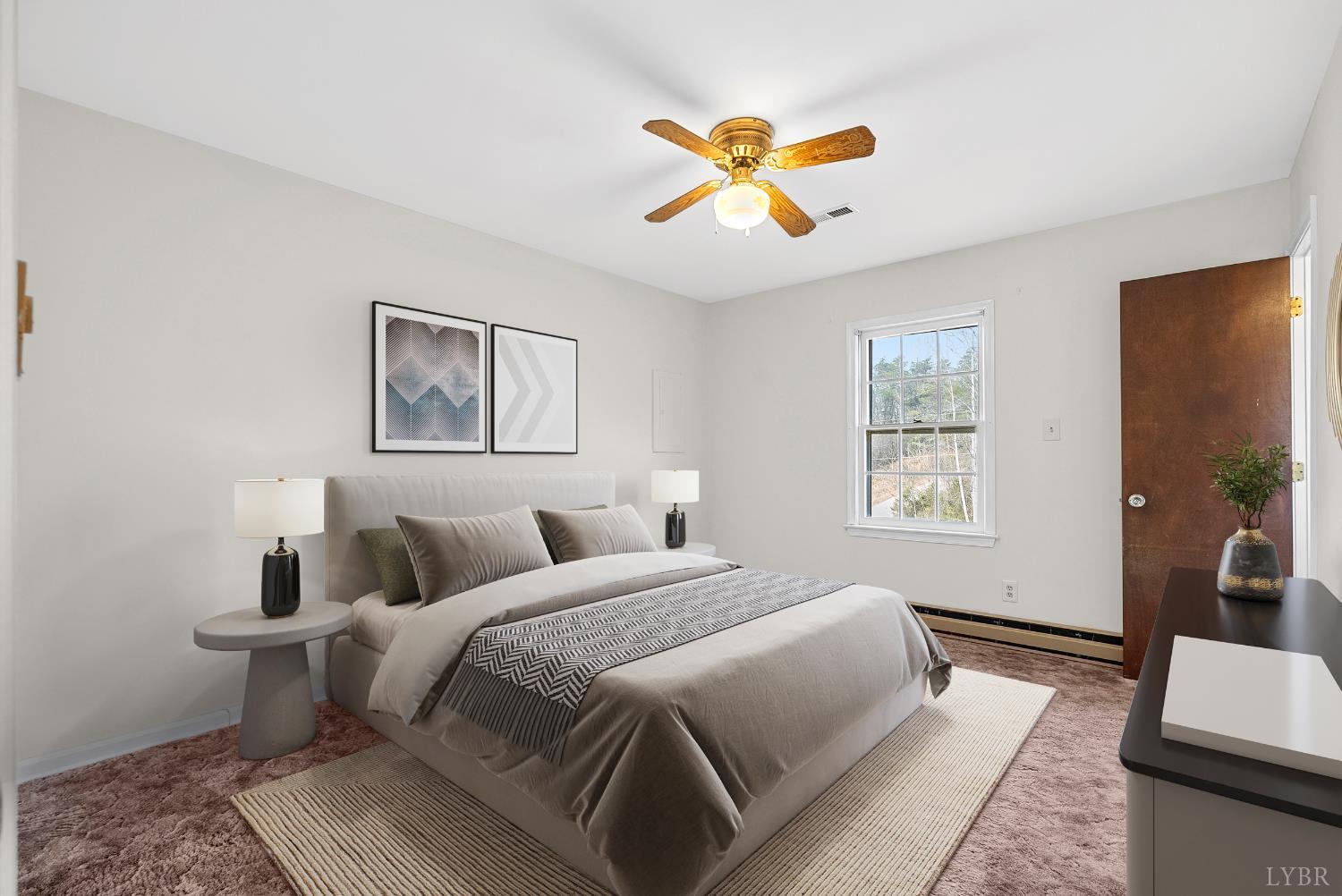 794 Little Dogwood Road Spout Spring, VA 24593 - Photo 17 of 54 a bedroom with a bed and a chandelier