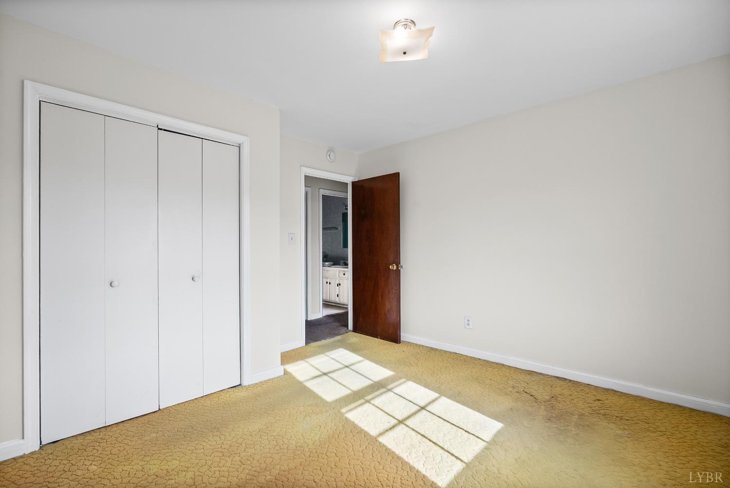 794 Little Dogwood Road Spout Spring, VA 24593 - Photo 25 of 54 a view of an empty room
