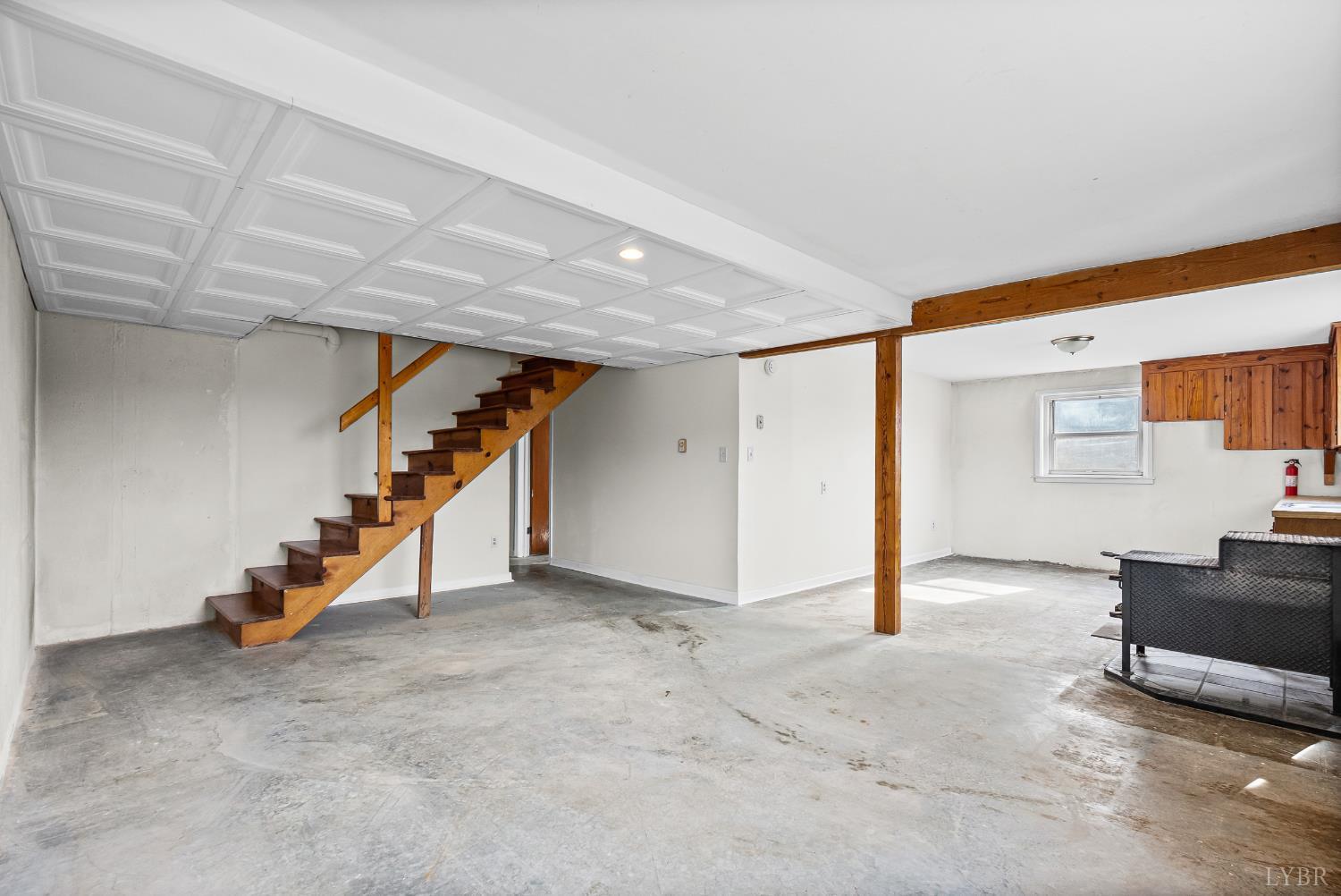 794 Little Dogwood Road Spout Spring, VA 24593 - Photo 26 of 54 a view of a livingroom with staircase