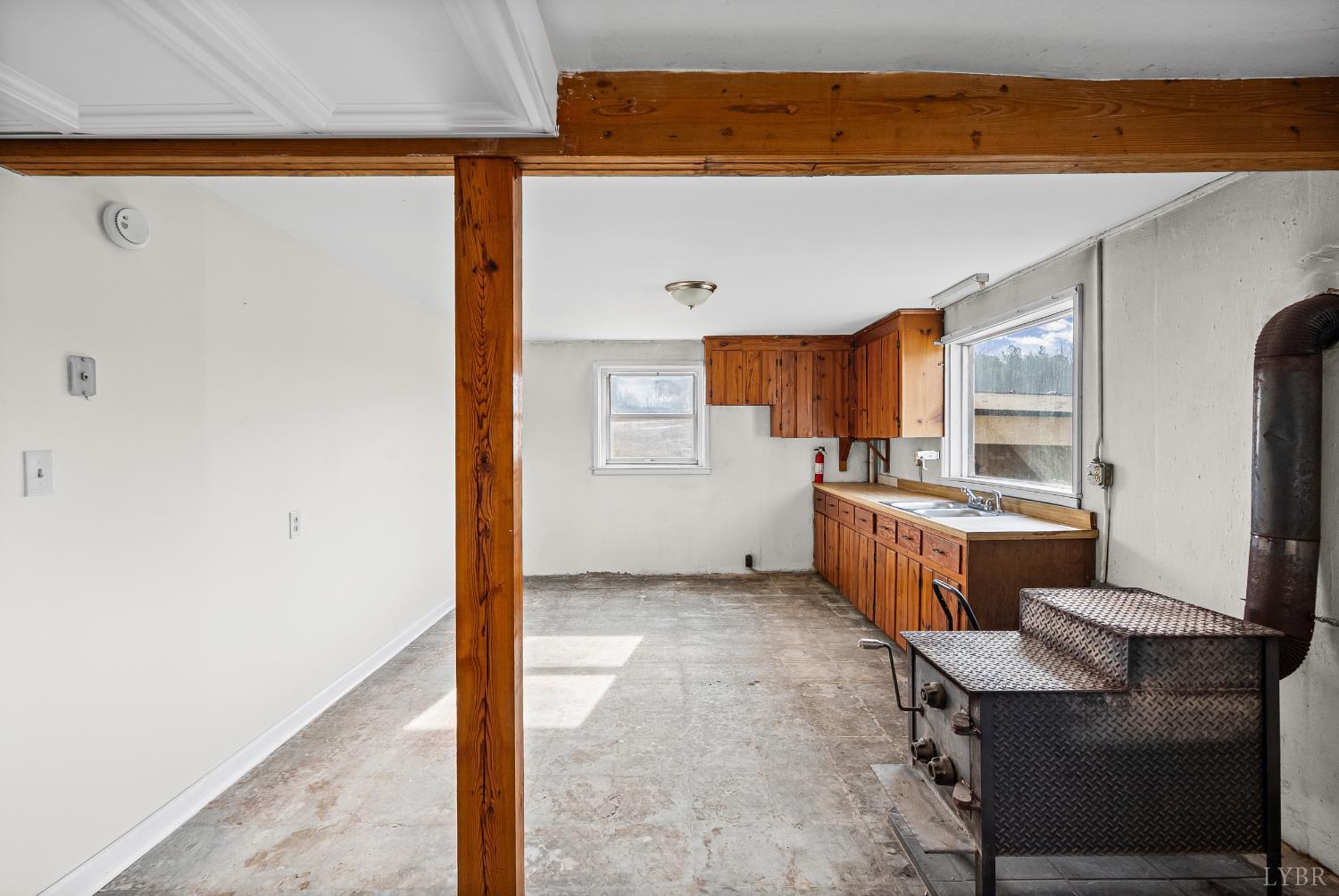 794 Little Dogwood Road Spout Spring, VA 24593 - Photo 30 of 54 a large bathroom with a tub and mirror