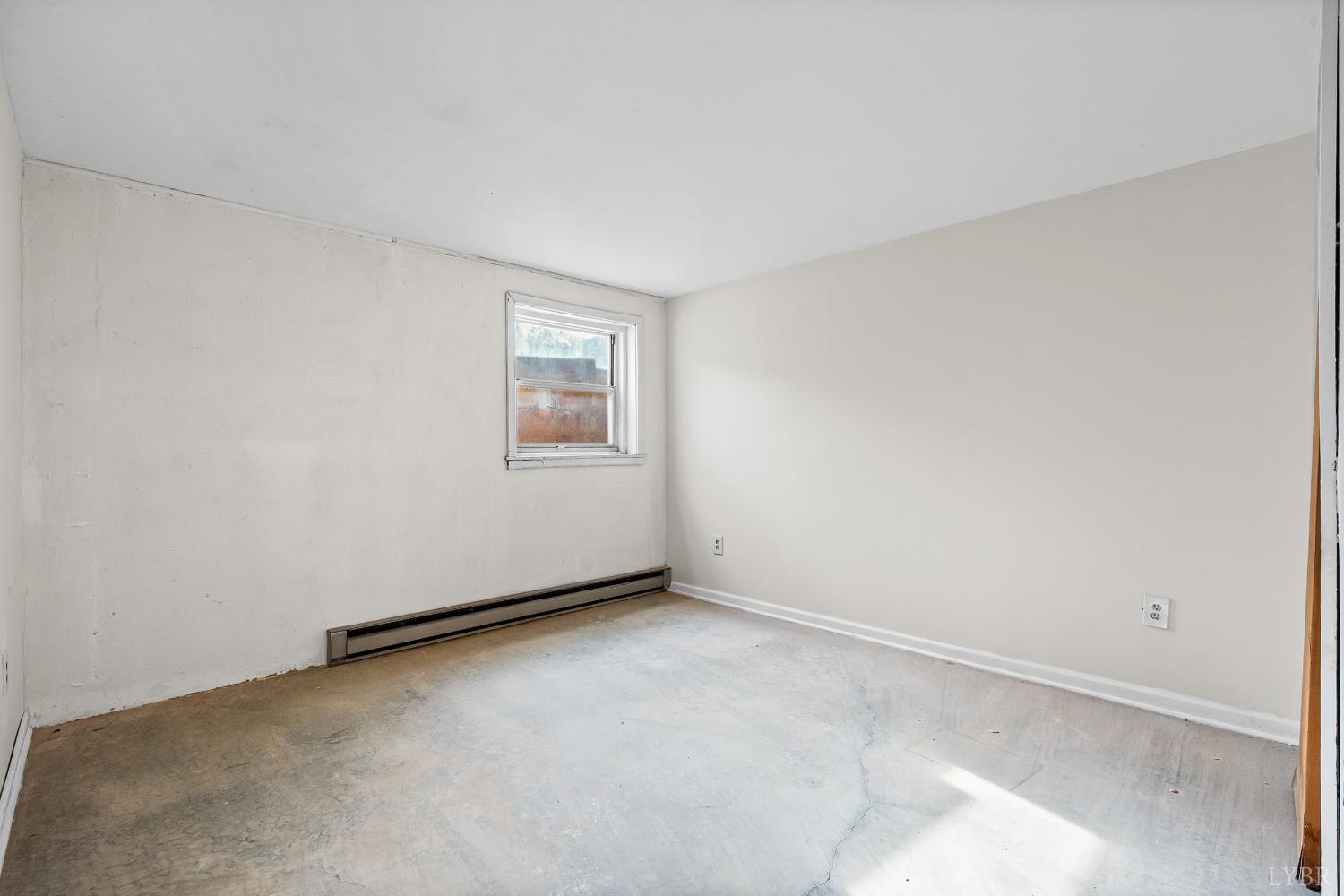 794 Little Dogwood Road Spout Spring, VA 24593 - Photo 35 of 54 a view of an empty room with a window