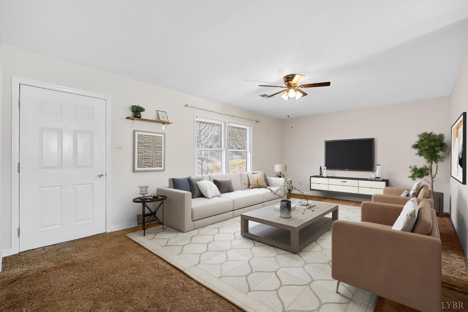 794 Little Dogwood Road Spout Spring, VA 24593 - Photo 4 of 54 a living room with furniture and a flat screen tv