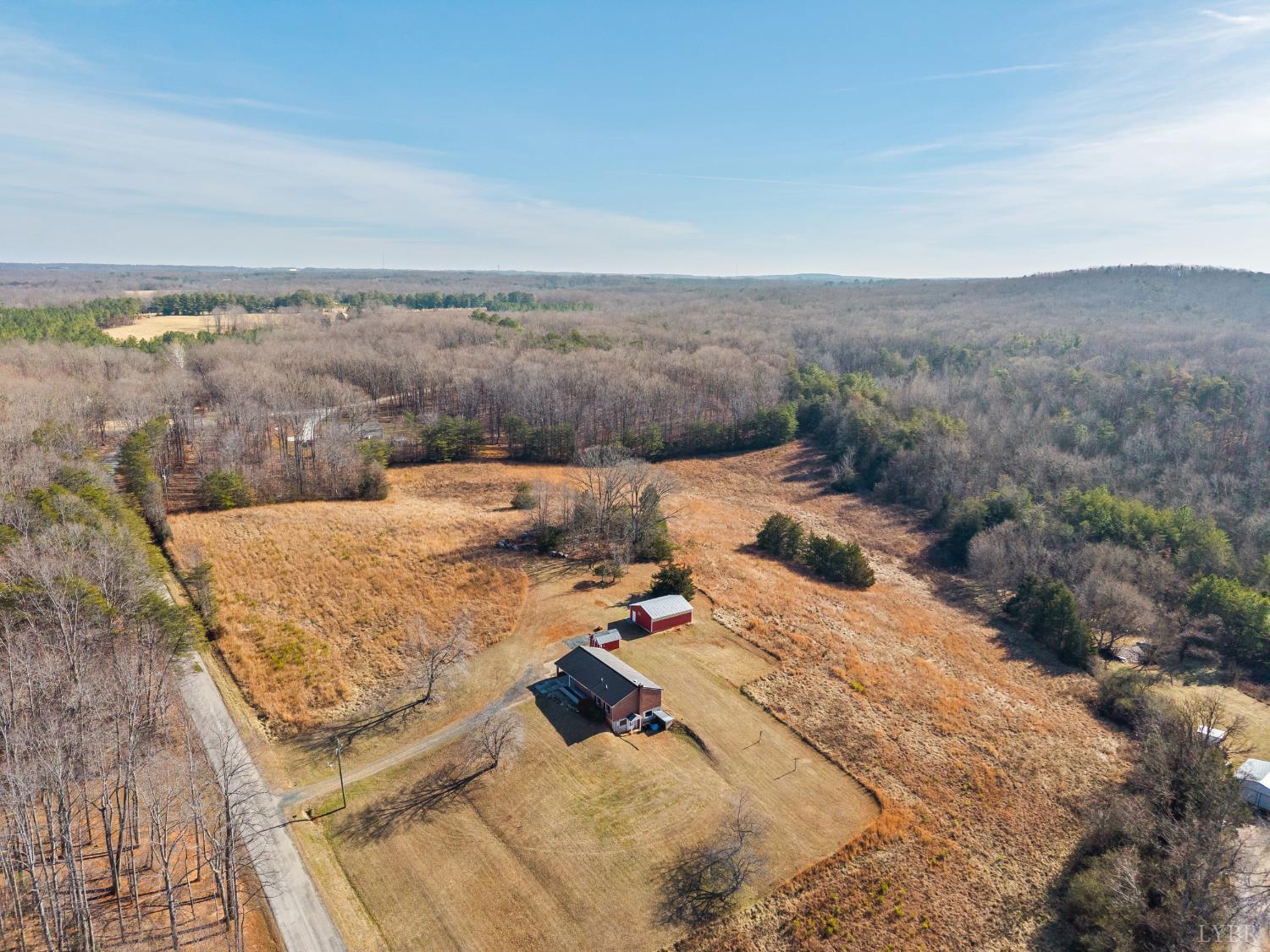 794 Little Dogwood Road Spout Spring, VA 24593 - Photo 50 of 54 an outdoor view of house with yard
