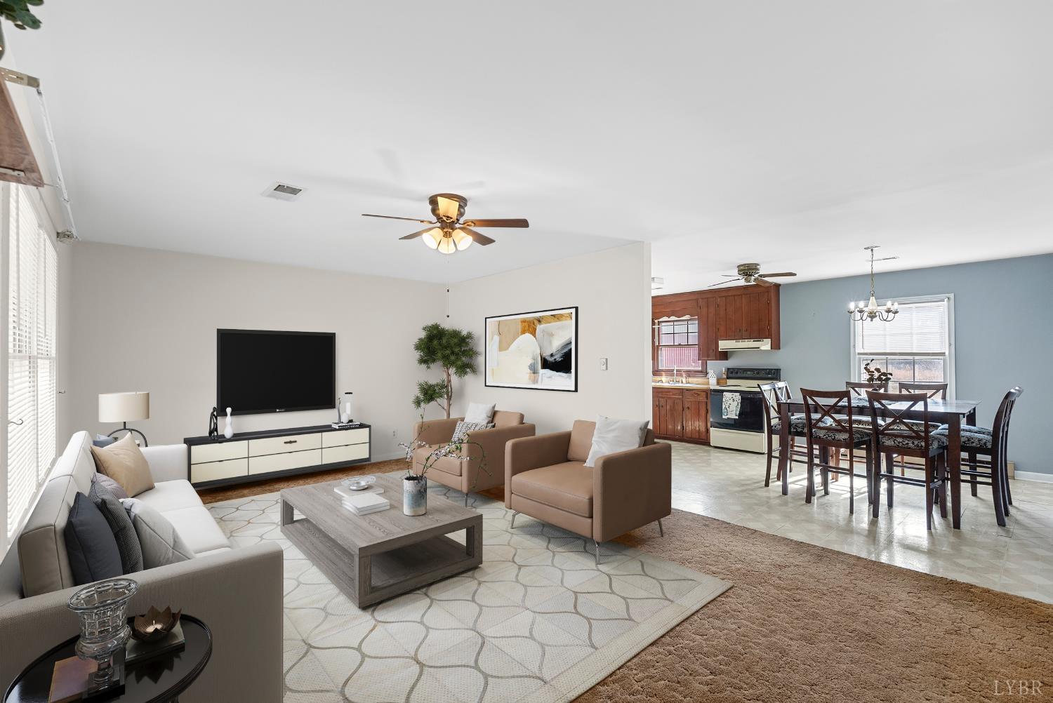 794 Little Dogwood Road Spout Spring, VA 24593 - Photo 6 of 54 a living room with furniture and a flat screen tv