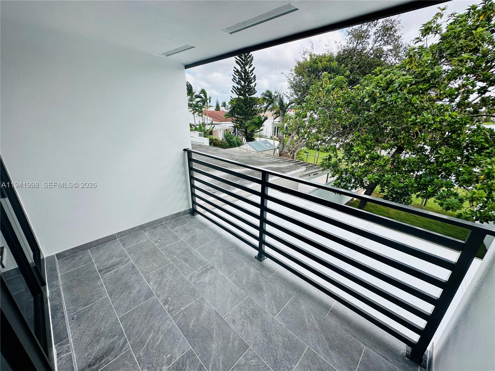 7157 West 19th Court, Unit 7157 Hialeah, FL 33014 - Photo 20 of 40 a view of a back yard