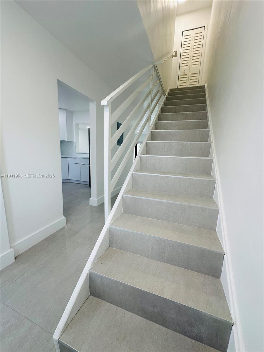 7157 West 19th Court, Unit 7157 Hialeah, FL 33014 - Photo 5 of 40 a view of entryway and hall