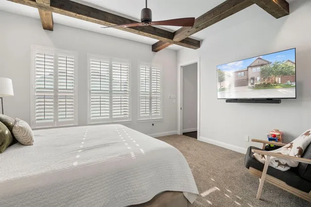 a bedroom with a bed and furniture