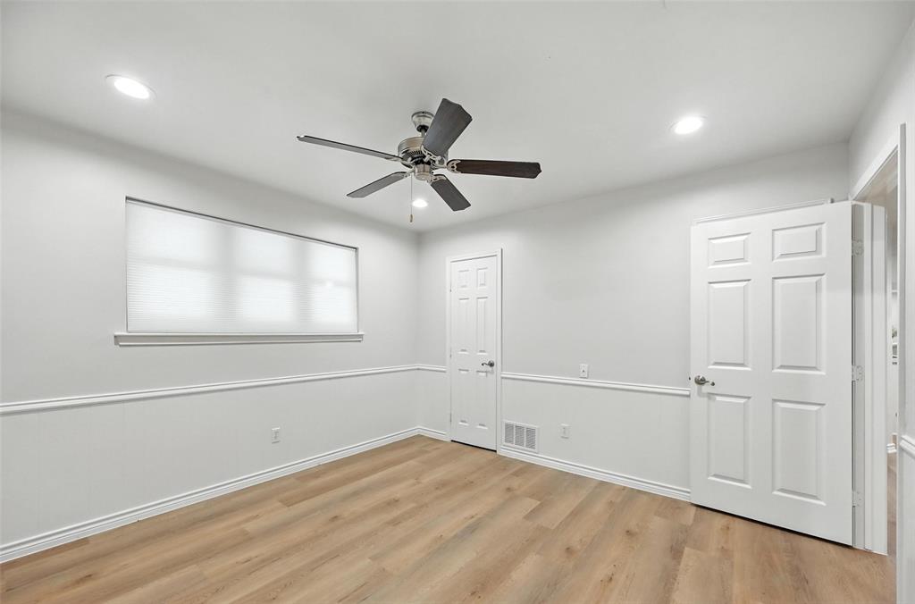 7407 Authon Drive Dallas, TX 75248 - Photo 21 of 31 wooden floor in an empty room with a window