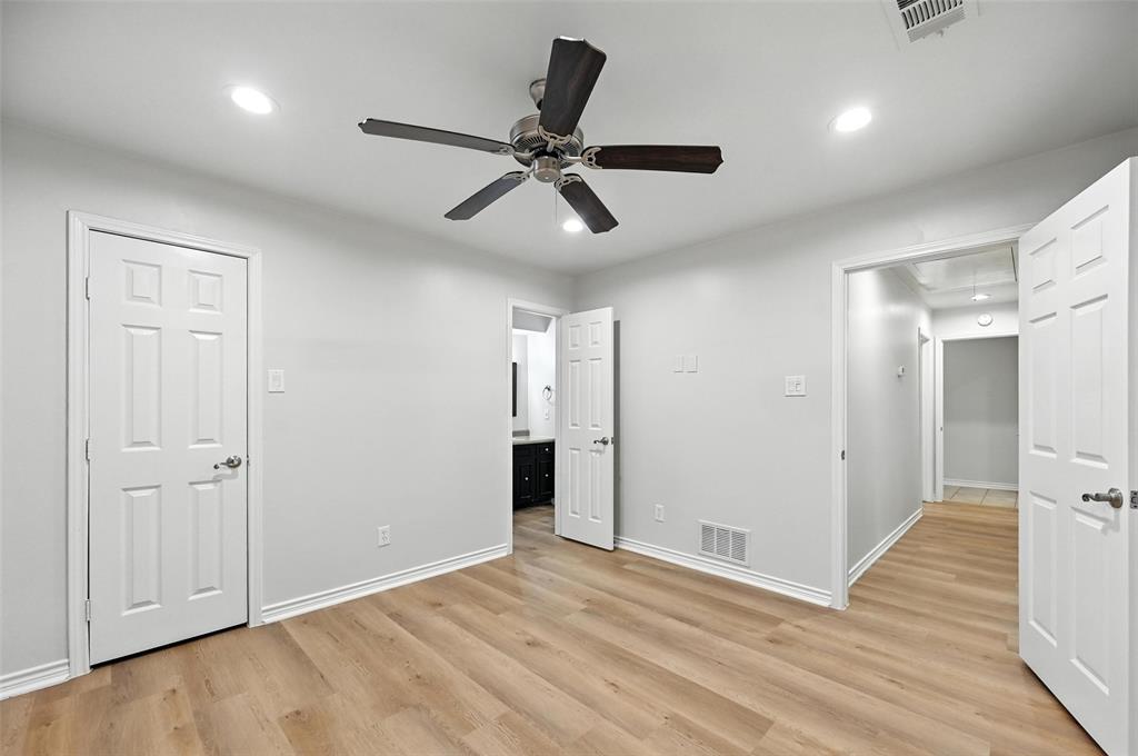 7407 Authon Drive Dallas, TX 75248 - Photo 27 of 31 a view of an empty room and wooden floor