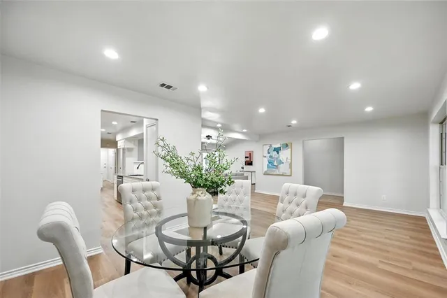 a view of a dining room with furniture