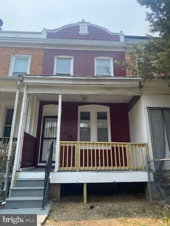 front view of a house with a balcony