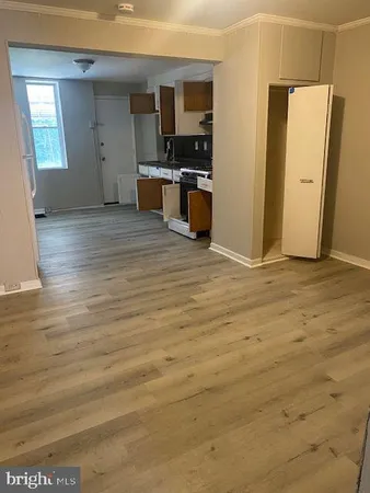 a kitchen with stainless steel appliances granite countertop a stove and a microwave