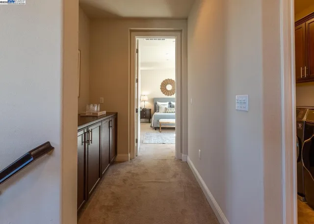 a bedroom with furniture and window